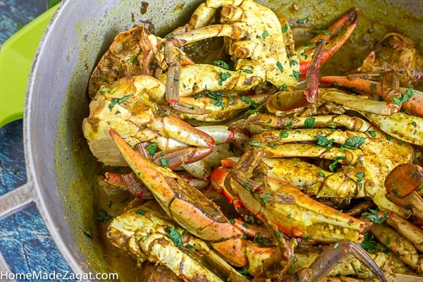 Pot of cooked blue crab in a large dutch pot.