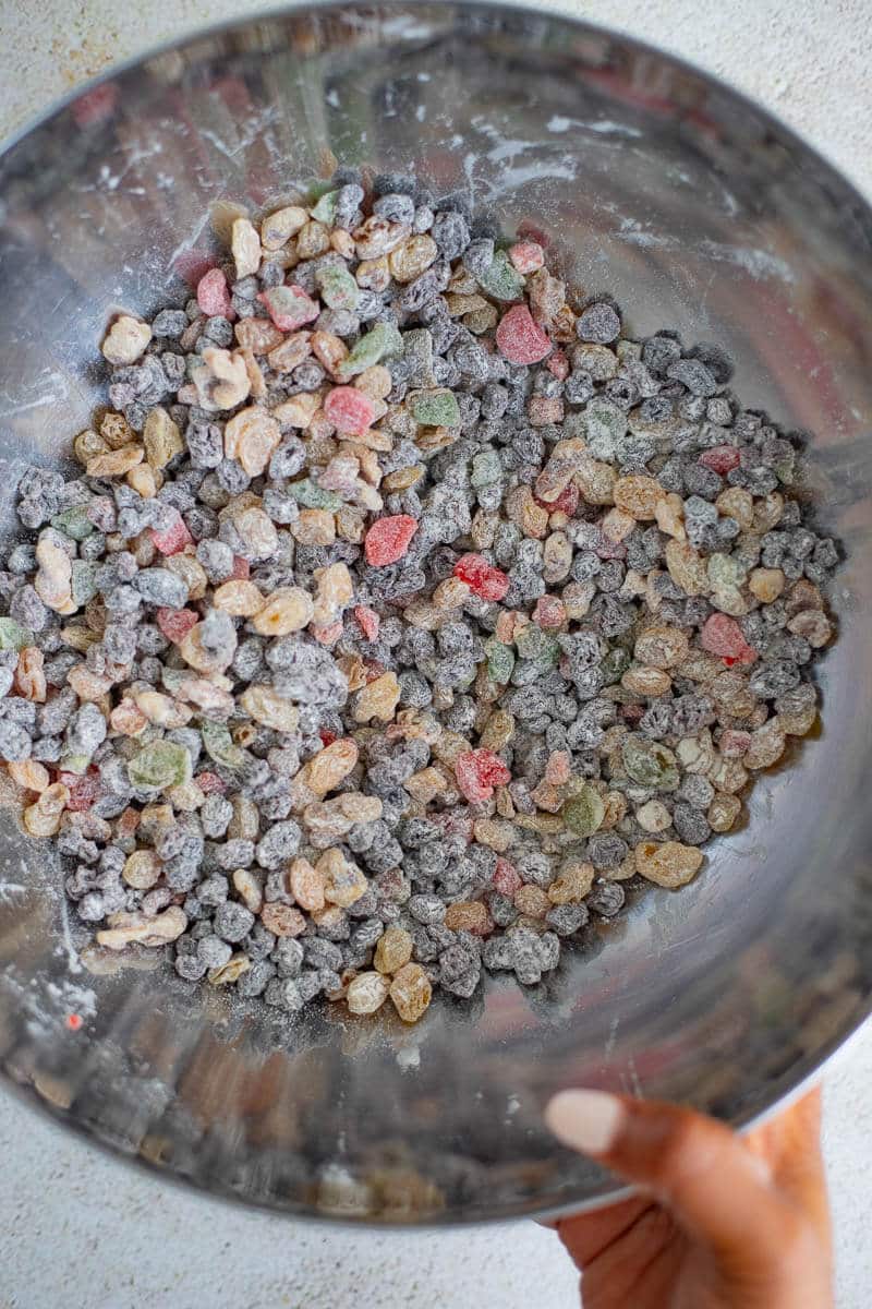 Fruits and nuts covered in flour.