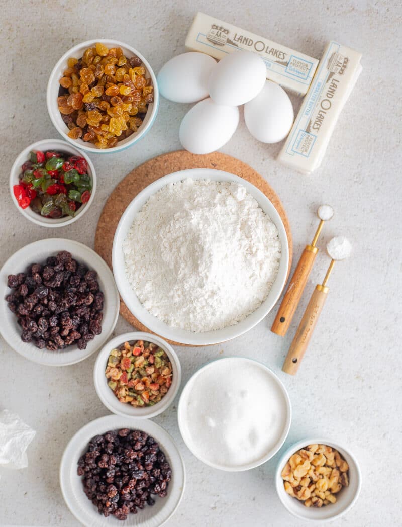The main ingredients for a dundee cake portioned out.
