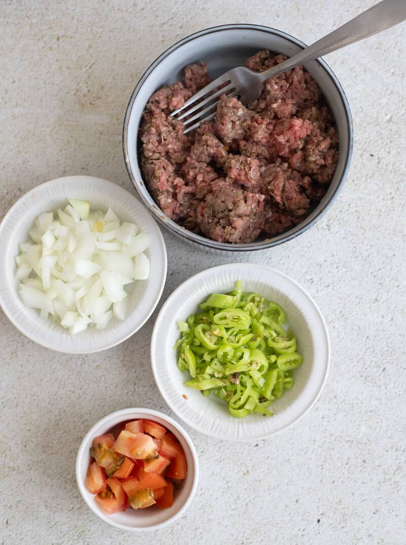 Ingredients to make the meat filling to stuff the eggplant.