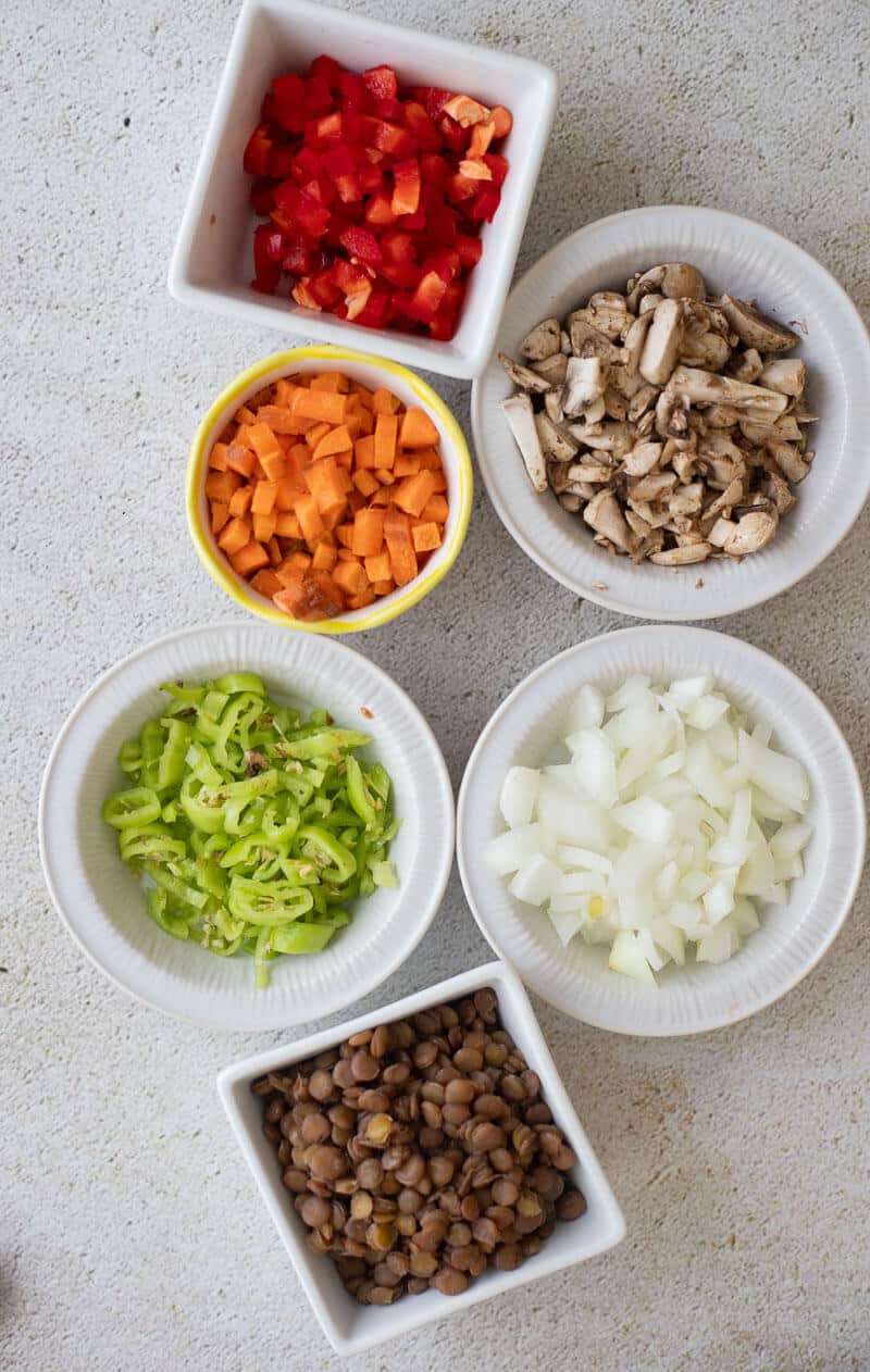 Ingredients to make veggie filling for stuffed eggplant.