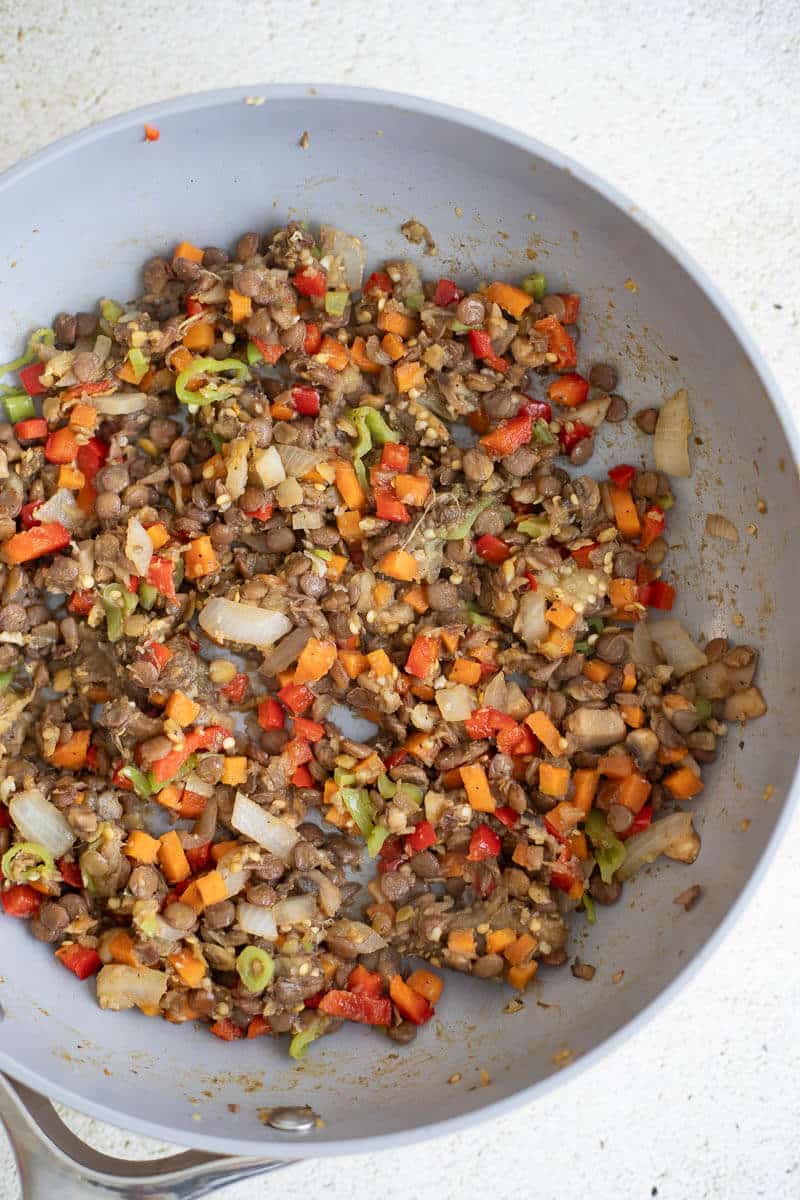 Cooked veggie filling for stuffing the eggplant.