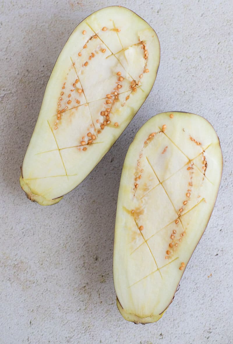 Eggplant halves scored and ready for roasting.