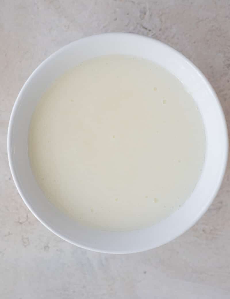 Blended cassava and water forming the smooth base for a cassava drink