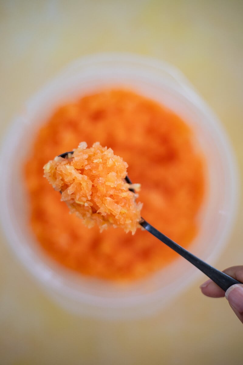 Finely grated green paw paw for making paw paw balls
