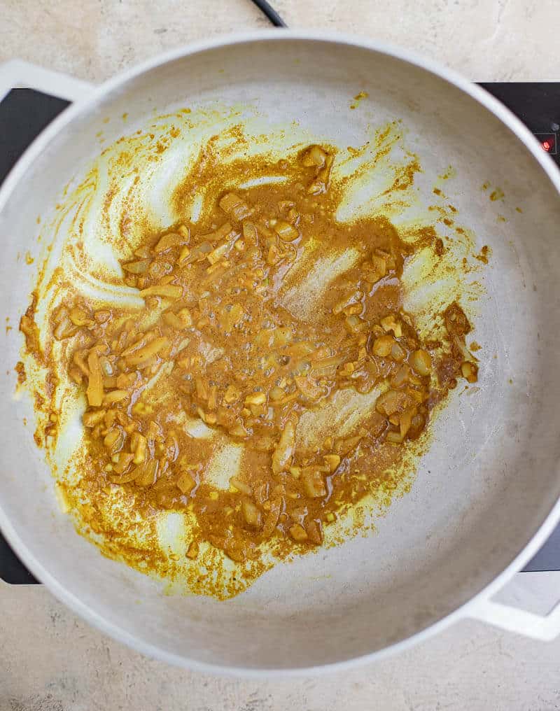 Curry powder cooked with onion and garlic before adding the remaining ingredients.