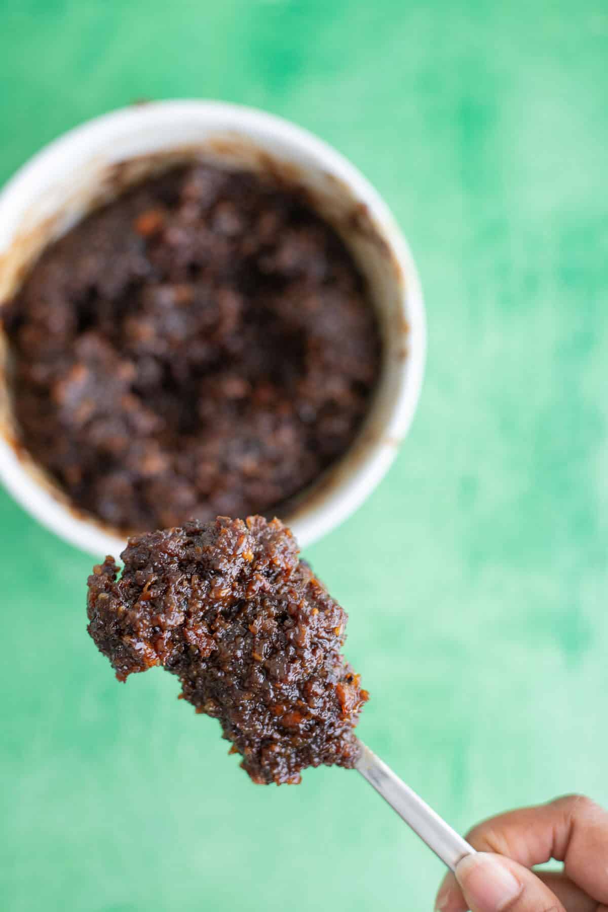 Blended rum-soaked fruits used to make black cake cinnamon rolls