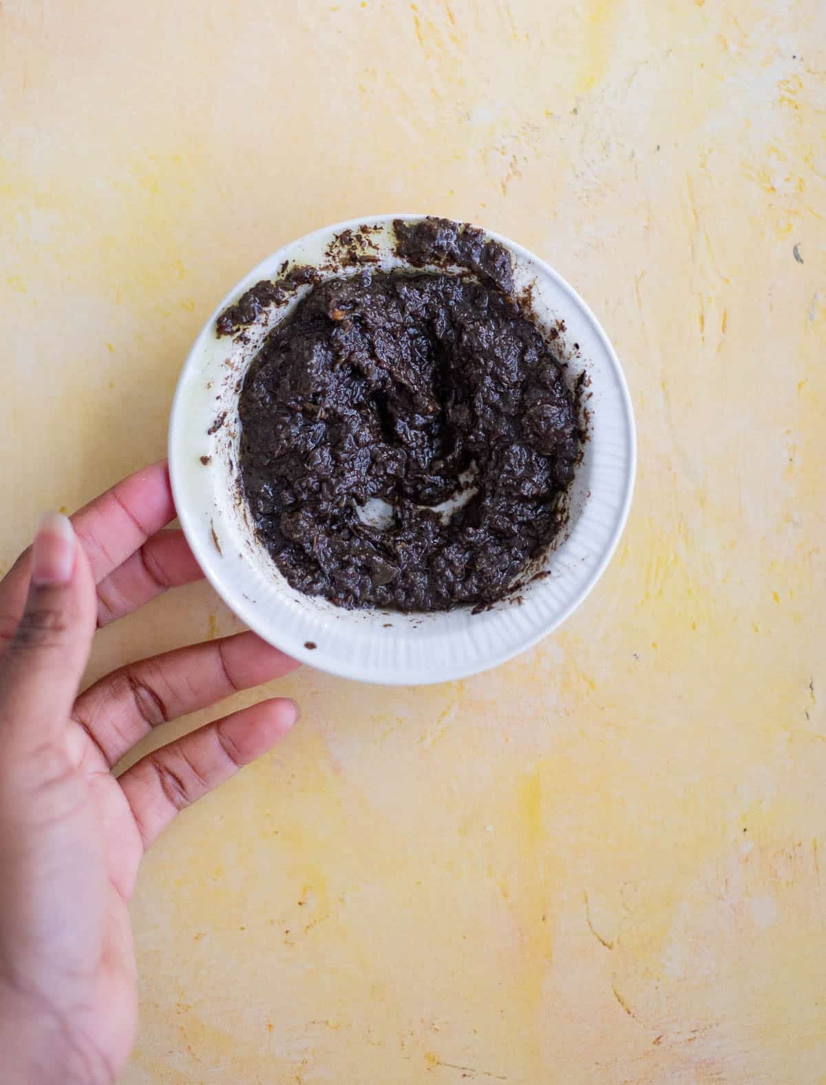 Wet jerk seasoning mixed with olive oil to make the marinade for baked jerk chicken.